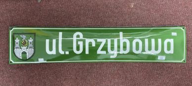 Poland enamel town sign, green with white lettering and coat of arms.