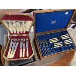 Plated Ware: Early 20th cent. Oak cased six place cutlery set, plus a boxed fruit set (six