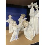 20th cent. Ceramics: Lladro Angel With Flute, Angel Thinking, Mini Angel, all unboxed, plus one