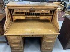 20th cent. Oak double pedestal tambour front desk with fully fitted interior. 50ins. x 49½ins. x