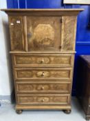 19th cent. Austrian/Swiss Biedermeier style walnut cabinet on bun feet and figured panels. 59½ins. x