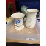 20th cent. Ceramics: Meissen blue/gilt miniature vase on four supports, cream baluster shape vase