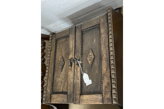 20th cent. Oak wall mounted cupboard, with applied beaded and diamond shaped mouldings. 20ins. x