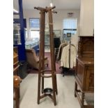 Aesthetic style rosewood hall/coat stand with cruciform hat peg top. Height 73½ins.