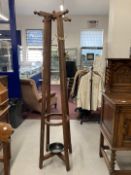 Aesthetic style rosewood hall/coat stand with cruciform hat peg top. Height 73½ins.