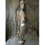 Tribal Art: Treen carved figure of a Masai Warrior with spear and gourd. 24ins.