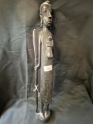 Tribal Art: Treen carved figure of a Masai Warrior with spear and gourd. 24ins.