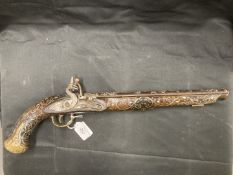 Militaria: 18th/19th cent. Anglo-Indian flintlock pistol inlaid with white metal decoration. 19ins.