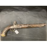 Militaria: 18th/19th cent. Anglo-Indian flintlock pistol inlaid with white metal decoration. 19ins.