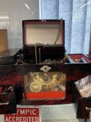 Musical jewellery box containing costume jewellery to include a white metal torque bangle, tests