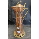 Art Nouveau: WMF copper and brass claret jug with stylised decoration.