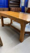 20th cent. Arts style oak refectory table square block and peg construction and hay fork stretchers,