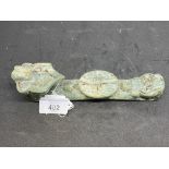 Oriental: 19th cent. Hard stone jadeite belt clip. 7½ins.