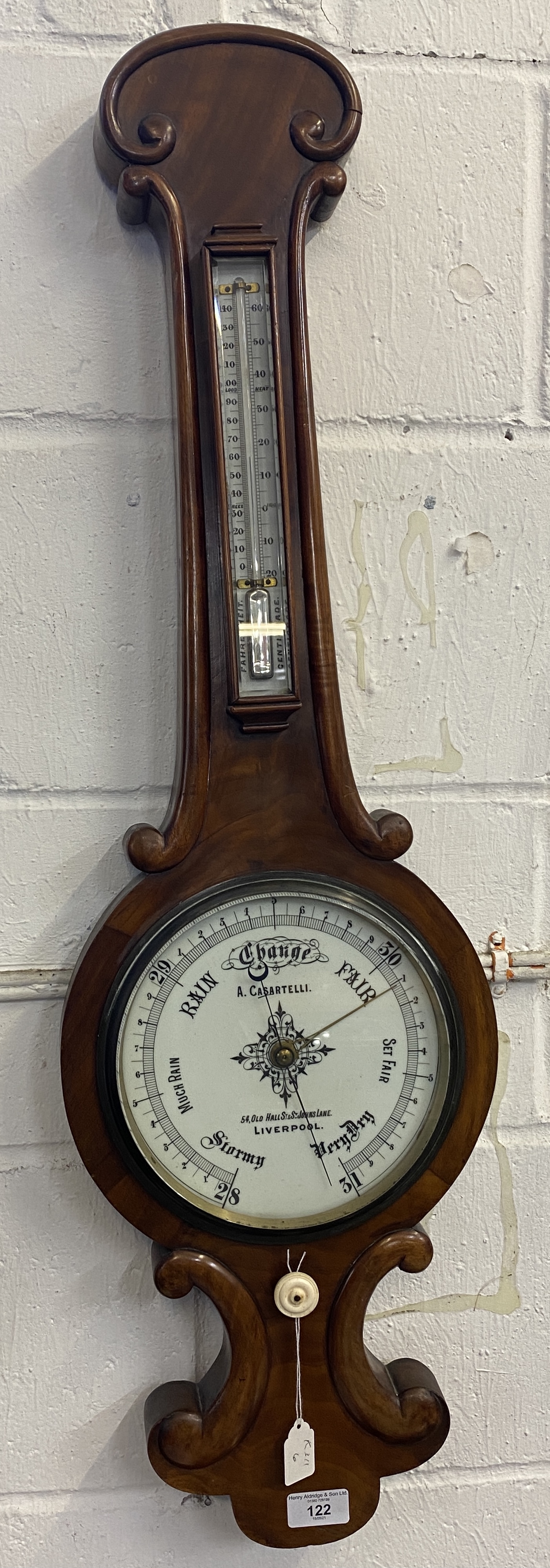 Early 20th cent. Mahogany banjo style barometer, white enamel dial with thermometer above. A.