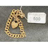 Hallmarked Jewellery: 9ct curb link bracelet plain and engraved links, padlock fastener,