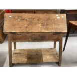 Late 19th cent. Pitch pine tack room table, the folding triangular top opening to form a work