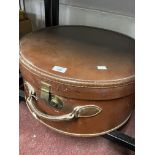 Early 20th cent. Leather hatbox, strap A/F. Dia. 20ins. Height 9ins.