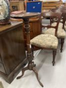 19th cent. Mahogany jardiniere stand on turned column on fine tripod, stamped C 9775 to base.