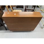 1970s teak drop leaf table, retailed by McIntosh. 59ins. x 36ins extended. 8½ins. x 36ins stowed.