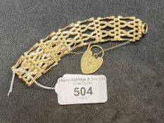 Hallmarked Jewellery: 9ct gold fancy link gate bracelet padlock fastener, width 19mm, length 7ins.