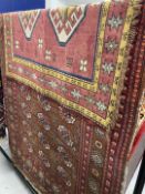 Carpets/Rugs: 20th cent. Red ground rug. 47ins. x 71ins. Plus one other maroon ground. 40ins. x