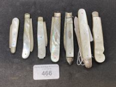 19th cent. Hallmarked silver and mother of pearl folding fruit knives. (7)