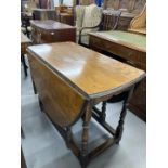 20th cent. Oak gate leg table. 40ins. x 58ins. x 30ins.