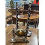 Late 19th early 20th cent. Pair of stained oak barley twist candlesticks and small brass 'Dinner'