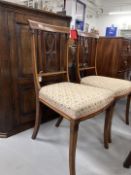 19th cent. Mahogany Regency revival satinwood and ebony inlaid hall chairs, spindle carved backs,