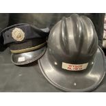 United States Fire Helmet Marked WYSOY Vol Fire Co. Plus a Brook Park Fire Dept. peaked cap. (2)