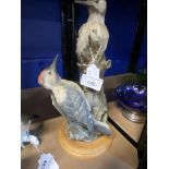 20th cent. Ceramics: Bisque figurine of two woodpeckers on tree stump, on treen stand, unmarked.