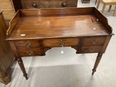 Late 19th/early 20th cent. Mahogany galleried ladies desk with five drawers, on turned supports.