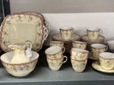 20th cent. Ceramics: Royal Worcester twelve place setting tea set, cream ground, pink border with