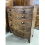 19th cent. Mahogany bow front chest of two short drawers and three long drawers on swept bracket