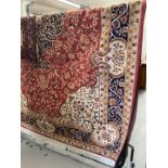 Carpets & Rugs: 21st cent. Keshen carpet, red ground. 9ft. 2ins. x 6ft. 6ins.