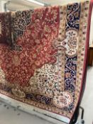 Carpets & Rugs: 21st cent. Keshen carpet, red ground. 9ft. 2ins. x 6ft. 6ins.