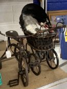 Toys: Dolls toys reproduction of a 19th cent. Metal and basket ware dolls pram and a reproduction of