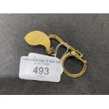 USA Gold Half Eagle coin with yellow metal keyring. 8.8g coin, chain tests as 18ct. 7g.
