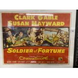 Movies: Soldier of Fortune starring Clark Gable. 26ins. x 20ins. Plus John Wayne's She Wore a Yellow