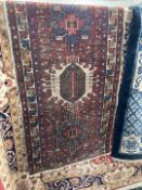 Carpets & Rugs: 20th cent. Bokhara runner, red ground, five guls with geometric pattern, three