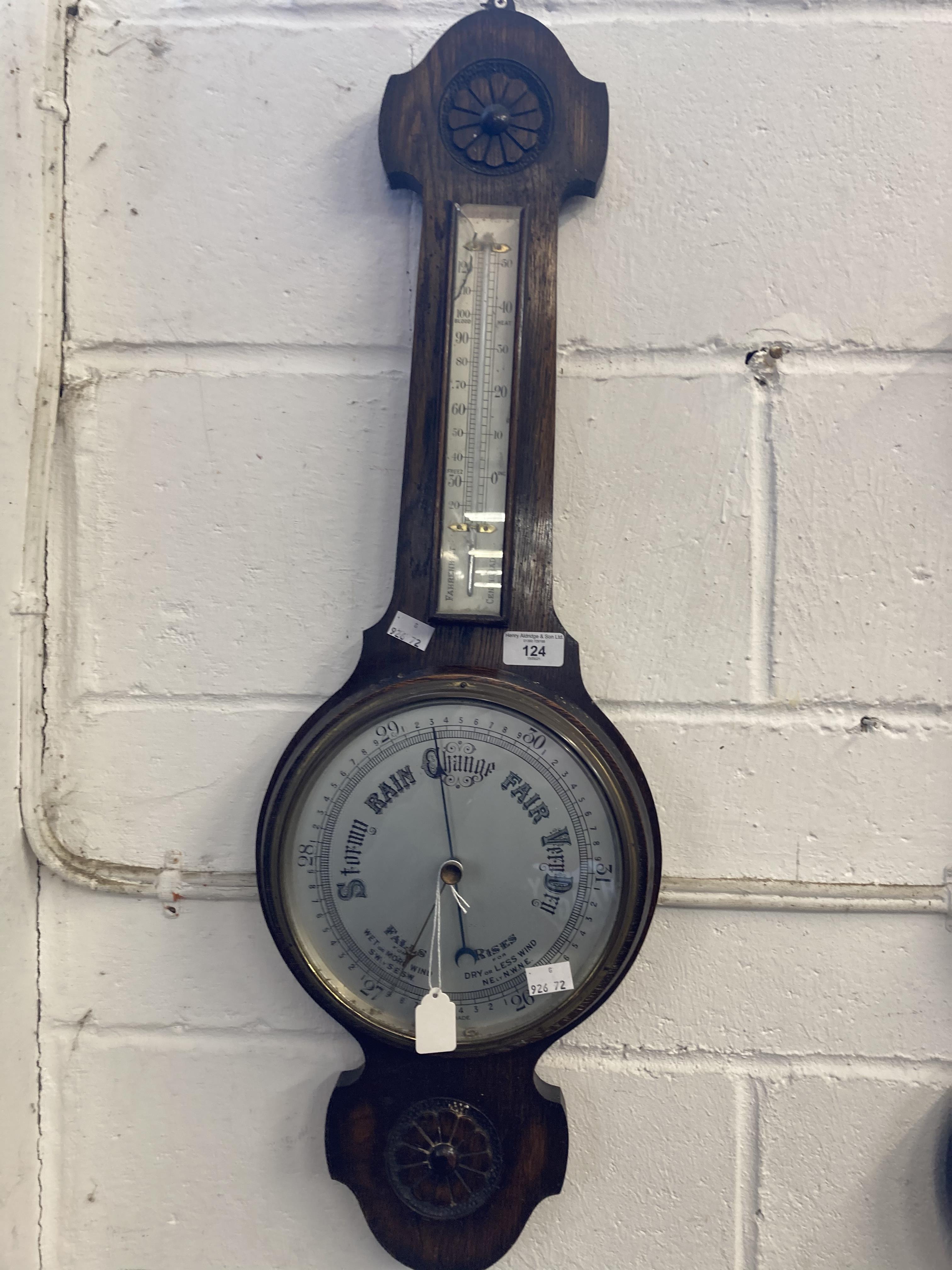 Early 20th cent. Oak banjo barometer with stylised flower decoration, metal face and separate