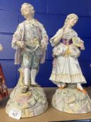 Late 19th early 20th cent. German figurines, man and woman picking flowers, multicoloured