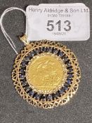 GB Gold jewellery George V 1913 Sovereign in ornate mount. 15g. Including mount.