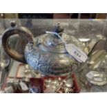 Hallmarked Silver: Rococco style squat teapot with treen handle and finial, worn London marks 1825/