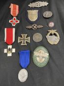 Militaria: Third Reich, a quantity of replica medals and badges to include Iron Cross 1st Class,