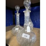 19th/20th cent. Glassware: Pair of wheel cut onion base decanters with elongated necks 10½ins