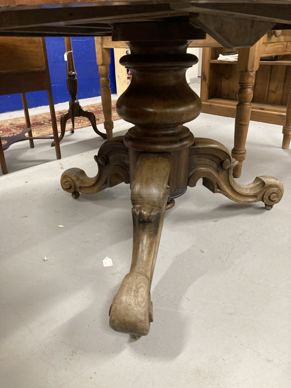 Late 19th cent. Mahogany oval tilt top loo table on ornate heavy three legged base with castors ( - Image 2 of 2