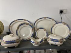 20th cent. Ceramics: Twenty three piece dinner service by Booths with a blue and fruit decorated