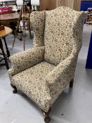 19th cent. Wing back upholstered armchair of good proportions.