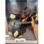 Toys: Steiff Musical Teddy Bear in original packaging, together with a watercolour of teddy bears on